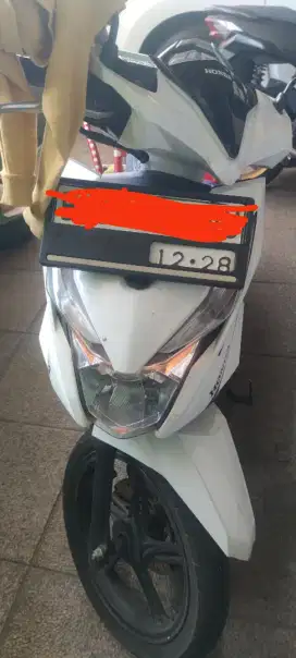 Motor beat putih