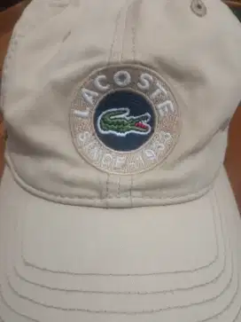 topi Lacoste ori