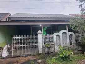 Rumah depan mesjid