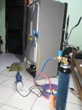 Service elektronik AC TV Kulkas Mesin Cuci DLL
