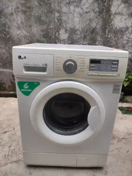 Mesin cuci front loading LG 7 KG inverter