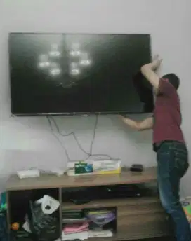 pasang dan jual bracket utk gantungan tv led lcd di tembok kuat nyaman