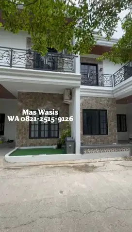 Rumah Desain Classic Plus Rooftop Cluster Mewah Kawasan Cibubur, Depok