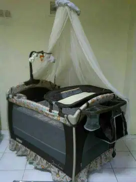Tempat tidur bayi Does