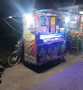 Kontainer becak jualan pulsa