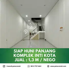 Rumah siap huni panjang dalam komplek inti kota medan