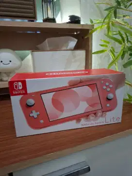 Jual Nintendo Switch Lite Coral - Baru Segel
