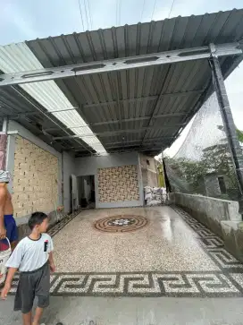 Batu sikat motif