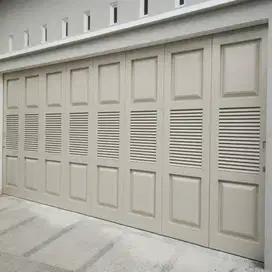 Terima pasang pintu garasi modern minimalis | Bandung Jaya Steel