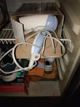 Hair dryer dan gosokkan