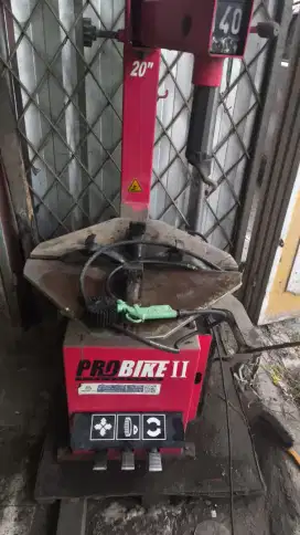 Alat buka ban otomatos