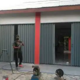 Folding gate rolling door