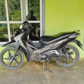 Honda Supra X 125 helm in FI Injeksi