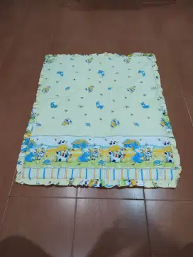 Kain alas ranjang bayi