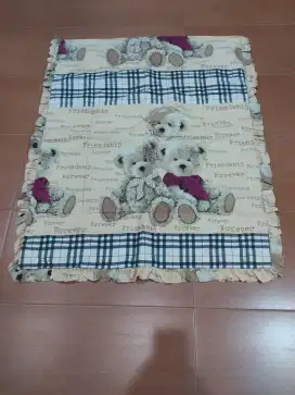 Kain alas ranjang bayi