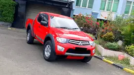 Mitsubitshi Triton Strada GLX 2.8 Double Cabin 4x4 MT Merah 2015/2016