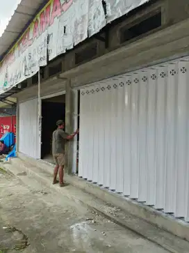 Produsen pintu Harmonika