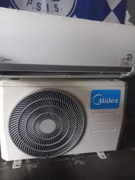 Jual AC 1/2 PK Midea plus pasang bergaransi