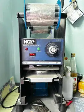 Mesin cup sealer masih garansi