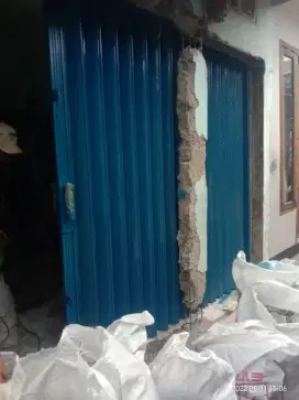 Tukang reparasi benerin rolling door folding gate