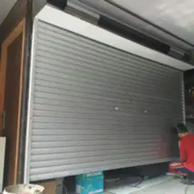 Tukang perbaikan pintu rolling door folding gate murah