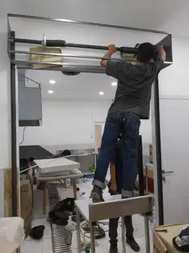 Tukang benerin pintu rolling door folding gate murah