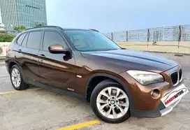 BMW X1 SDrive 18i Tahun 2012 Automatic Coklat metalik KM 40rb