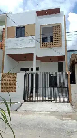 Booking Rumah dua lantai nan baru dikota mandiri Harapan Indah(C0224)