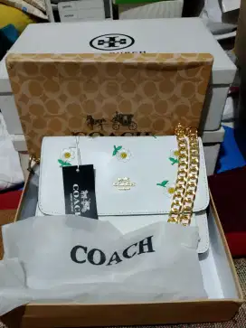 Tas merek COACH selempang warna putih bunga