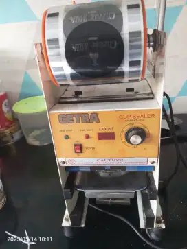 Mesin press gelas plastik