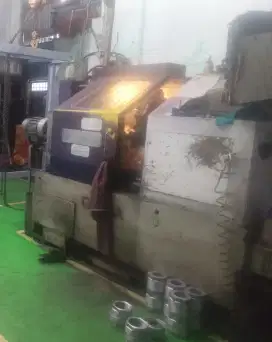 Mesin Bubut CNC Okuma Jepang
