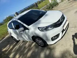 Brio satya E MT white manual upgrade type RS