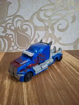 Robot mainan anak transformer asli