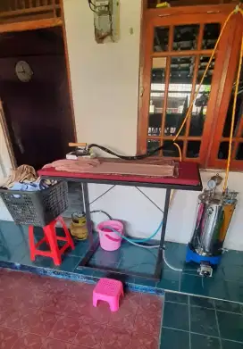 Setrika uap laundry