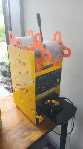 Mesin penyegel gelas plastik (cup sealer)