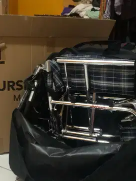 Kursi roda lipat (travelling), merek juara