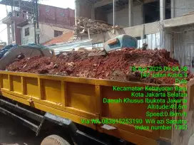 Tukang buang puing sampah proyek dll