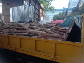 Tukang buang puing proyek dll