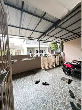 Rumah Siap Huni di Perumahan Taman di Harapan Baru, Bekasi