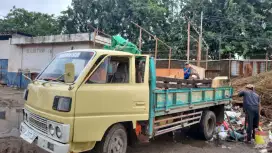 Urugan puing , tanah dan buang sampah