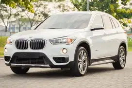 Siap Padel! BMW X1 F48 XLine 2018 White Panoramic 320i c200 a200