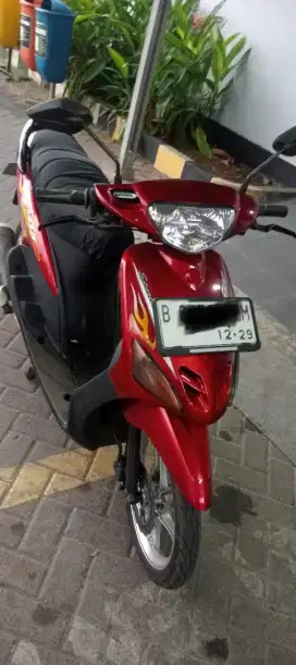 Mio sporti warna merah