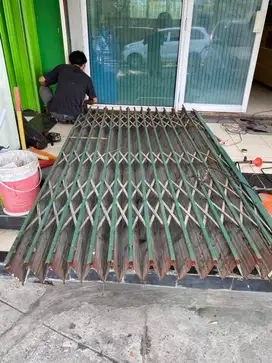 Ahli service dan pasang baru rolling door cibubur