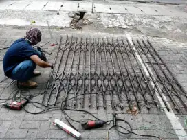 Ahli nya perbaikan rolling door folding gate