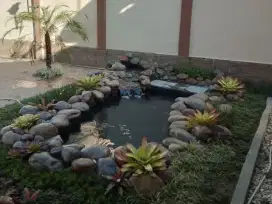 Kolam natural pond dengan taman minimalis