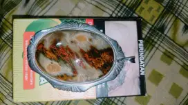 Liontin batu gambar