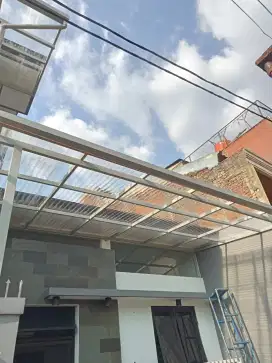 Kanopi atap solartuf gelombang  rangka besi holo galvanis