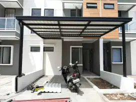 Kanopi bajaringan atap rumah gudang