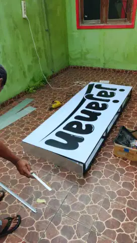 Neonbox akrilik plang papan nama reklame sign board & sticker kacafilm