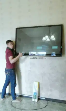 pasang dan jual bracket buat gantungan tv led lcd di tembok kuat kokoh